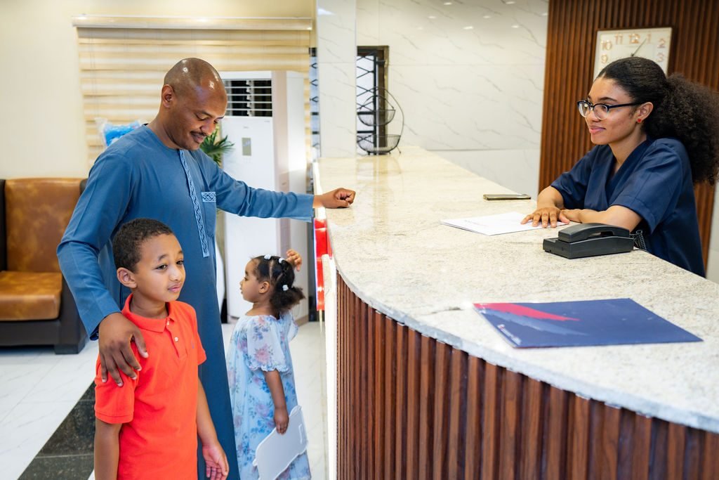 A family being welcomed at Hayat reception